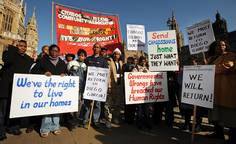 Chagossians protesting, seven years ago, outside the high court in London over the deportations from the Indian Ocean islands from 1967 to 1973. Photograph: Fiona Hanson/PA