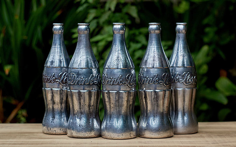 a contemporary artist reinterprets the classic glass coke bottle