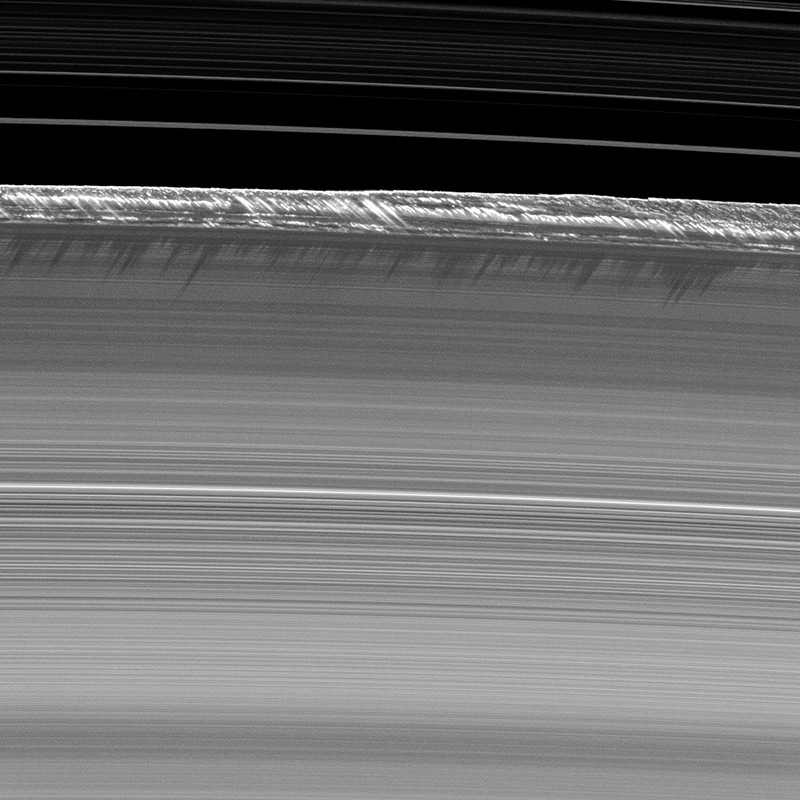 the ice mountains contained in the planet Saturns rings  - image copyright nasa